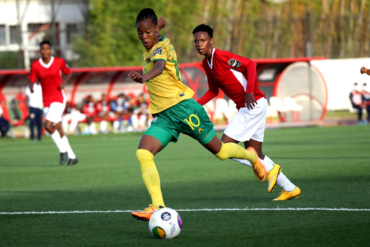 South Africa’s Linda Motlhalo playing the ball with a Burundi opponent at the 2022 Women’s Africa Cup of Nations